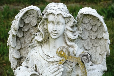 White concrete angel statue view
